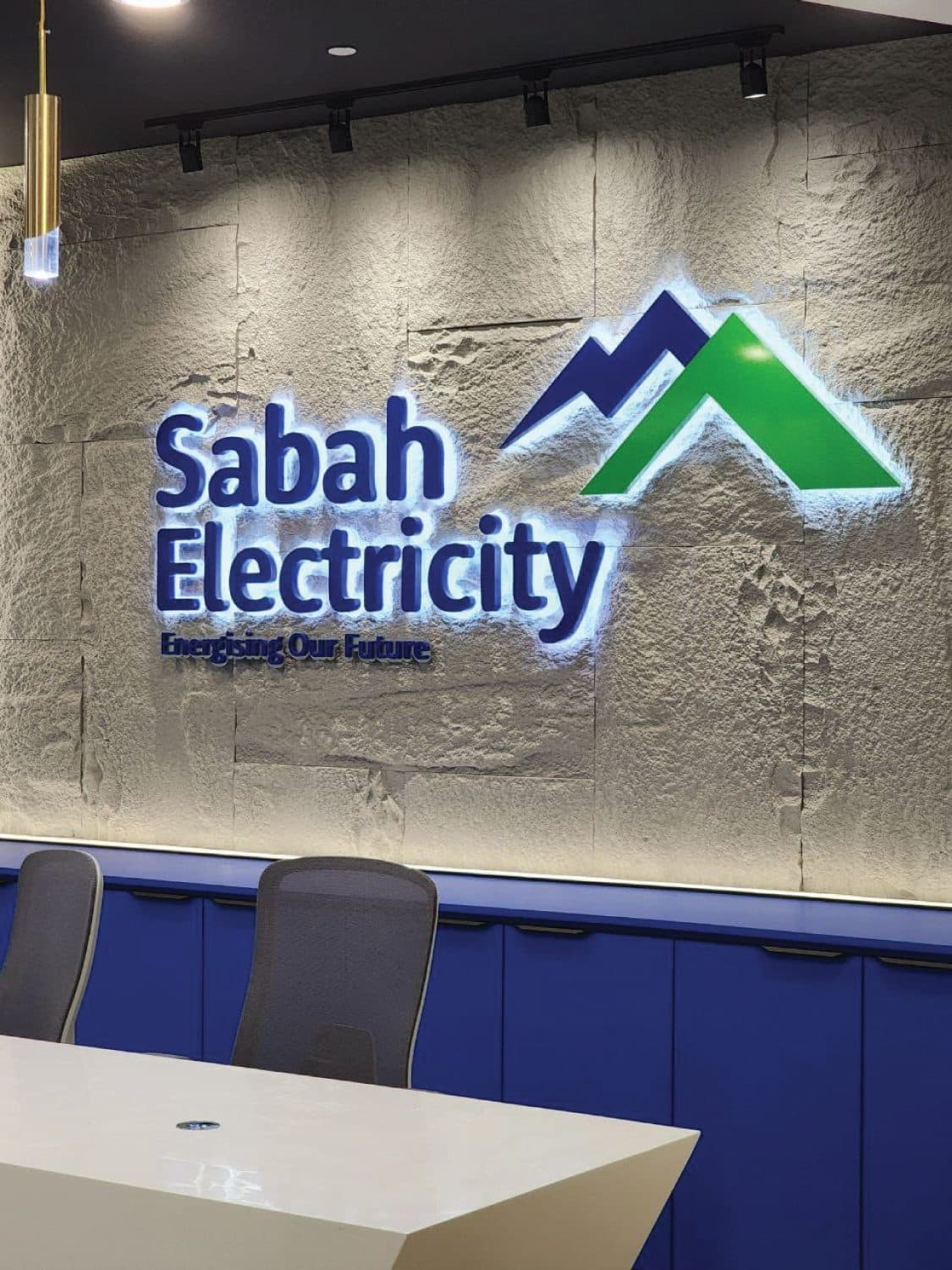 Sabah Electricity (SESB) — branded feature wall in textured stone
