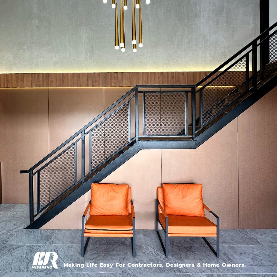MissReno showroom — stairwell with stone and timber finishes